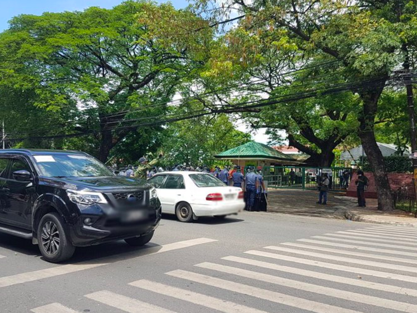Police in full-riot gear disperse and arrest members of cause-oriented groups staging a protest against the anti-terrorism bill outside the University of the Philippines (UP) Cebu on Friday morning, June 5, 2020. | Alven Marie Timtim 