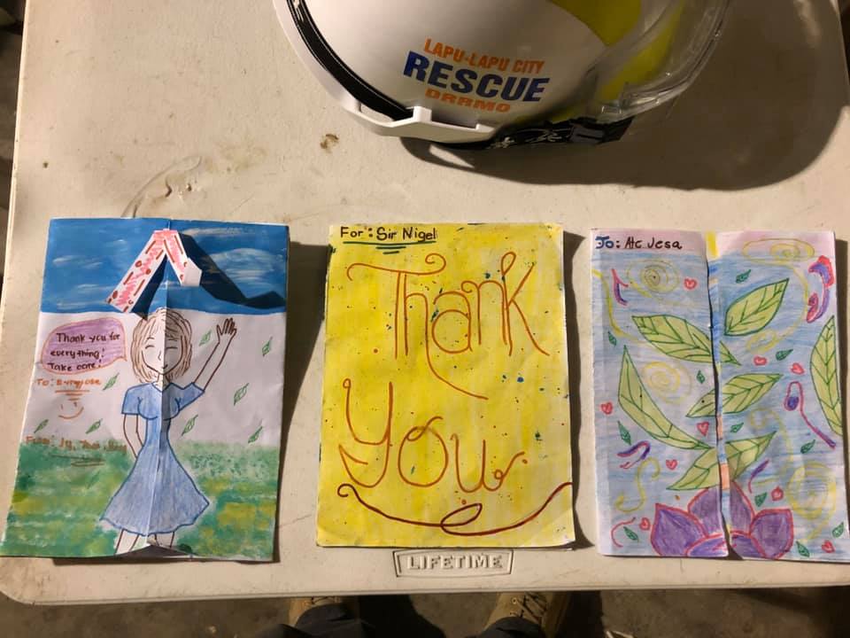 These are some of the thank you letters from the children that personnel of the Lapu-Lapu Disaster Risk Reduction and Management Office (DRRMO) have taken care of when their parents got the virus and were placed under isolation. | Photo courtesy of Nagiel Bañacia