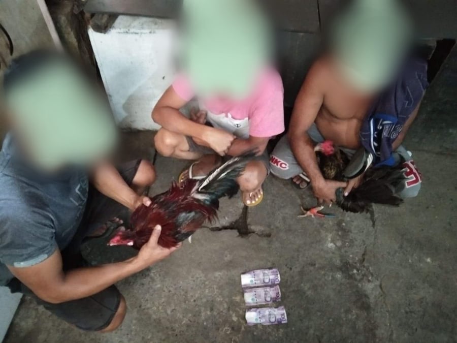 Labangon policemen arrest three men who were caught engaging in "tigbakay" in Sitio Mayupay, Barangay Quiot, Cebu City, at around 3:30 p.m. this Sunday, August 2, 2020. | Photo Courtesy of Police Captain Jonathan Dela Cerna