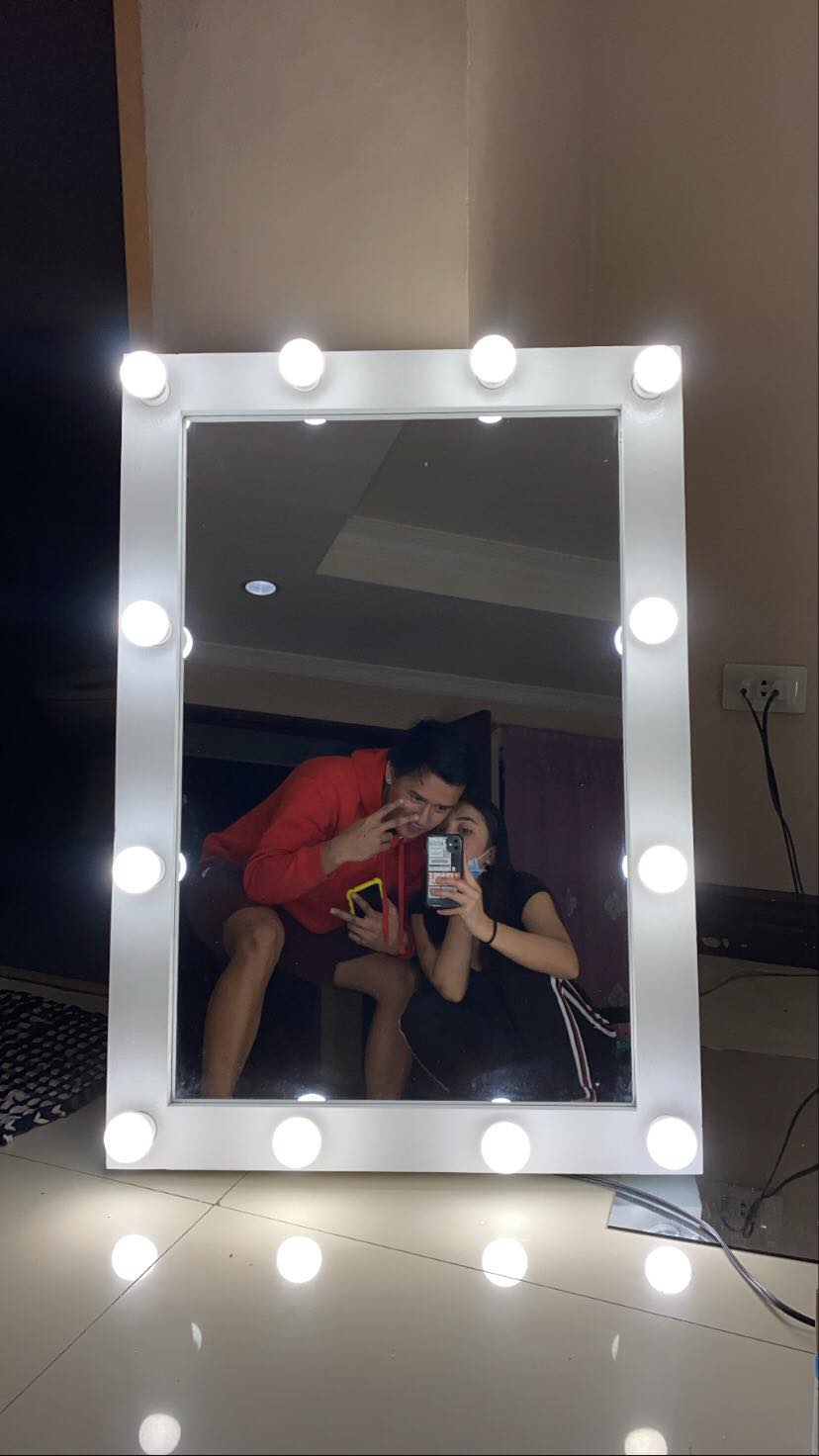 Kurt Trangia and girlfriend Joy Mantos showing off their finished vanity mirror made by Kurt himself. | Contributed photo.