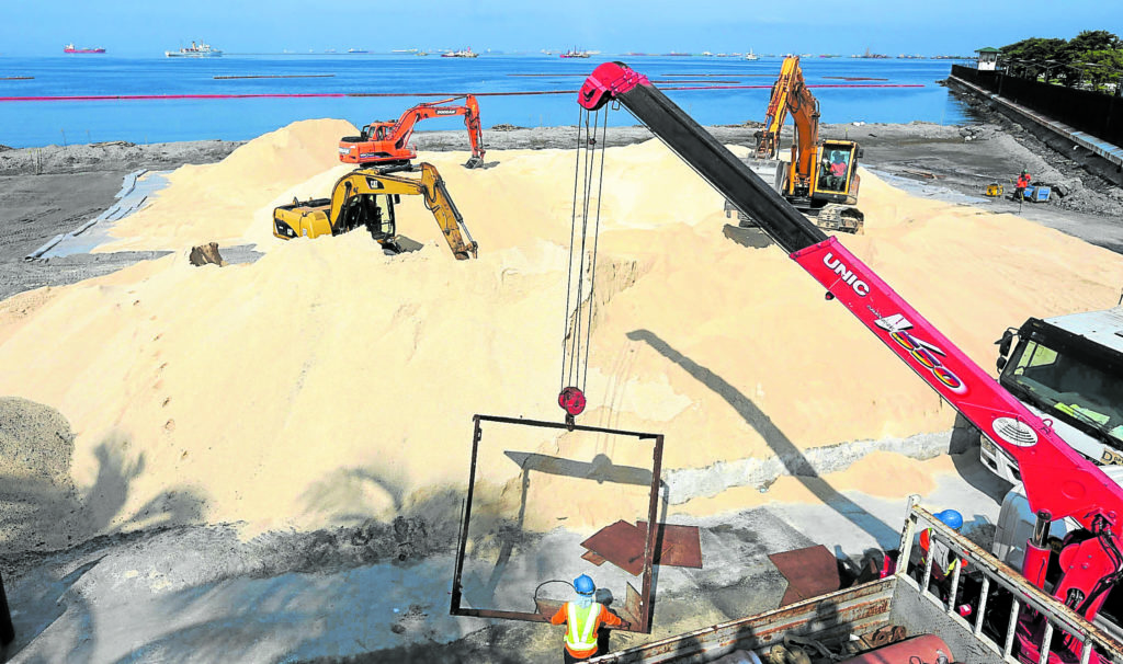 Garcia and Dolomites for Manila Bay. Workers continue to pour on September 5, 2020, white sand composed of crushed dolomite over the 500 meter stretch of Manila bay, part of the DENR's Manila bay rehabilitation project aimed at discouraging people from littering in the ocean that has now drawn ire from advocates. Cebu Governor Gwendolyn Garcia has also issued a cease and desist order on the mining firm that was involved in the selling and transport of the dolomites from Alcoy town in southern Cebu to Manila Bay. |Inquirer file Photo