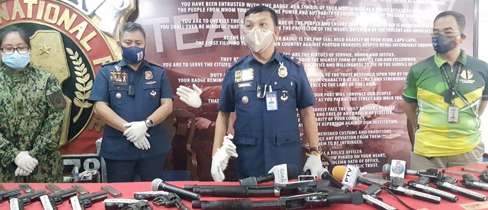 PRO-7 Director Albert Ignatius Ferro (3rd from left) presents the confiscated firearms to the media on this October 9, 2020 photo. | CDN Digital file photo (Alven Marie Timtim)
