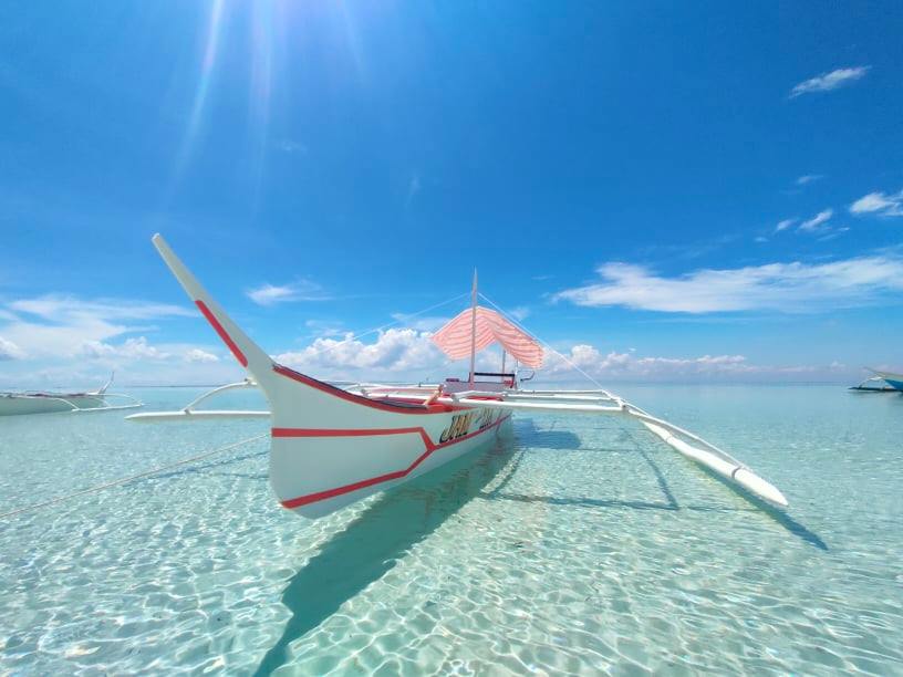The crystal clear waters of Bantayan Island is one of its many charms. | Photo courtesy of Jake Edward Aquino