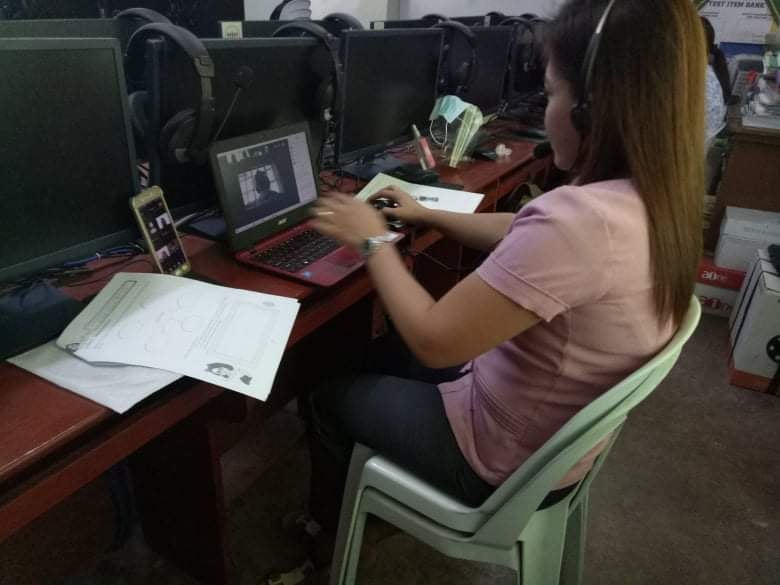 Teachers in Mandaue National Science High School focus on their online classes on Monday, October 5. | Photo courtesy of Mae Hinoguin