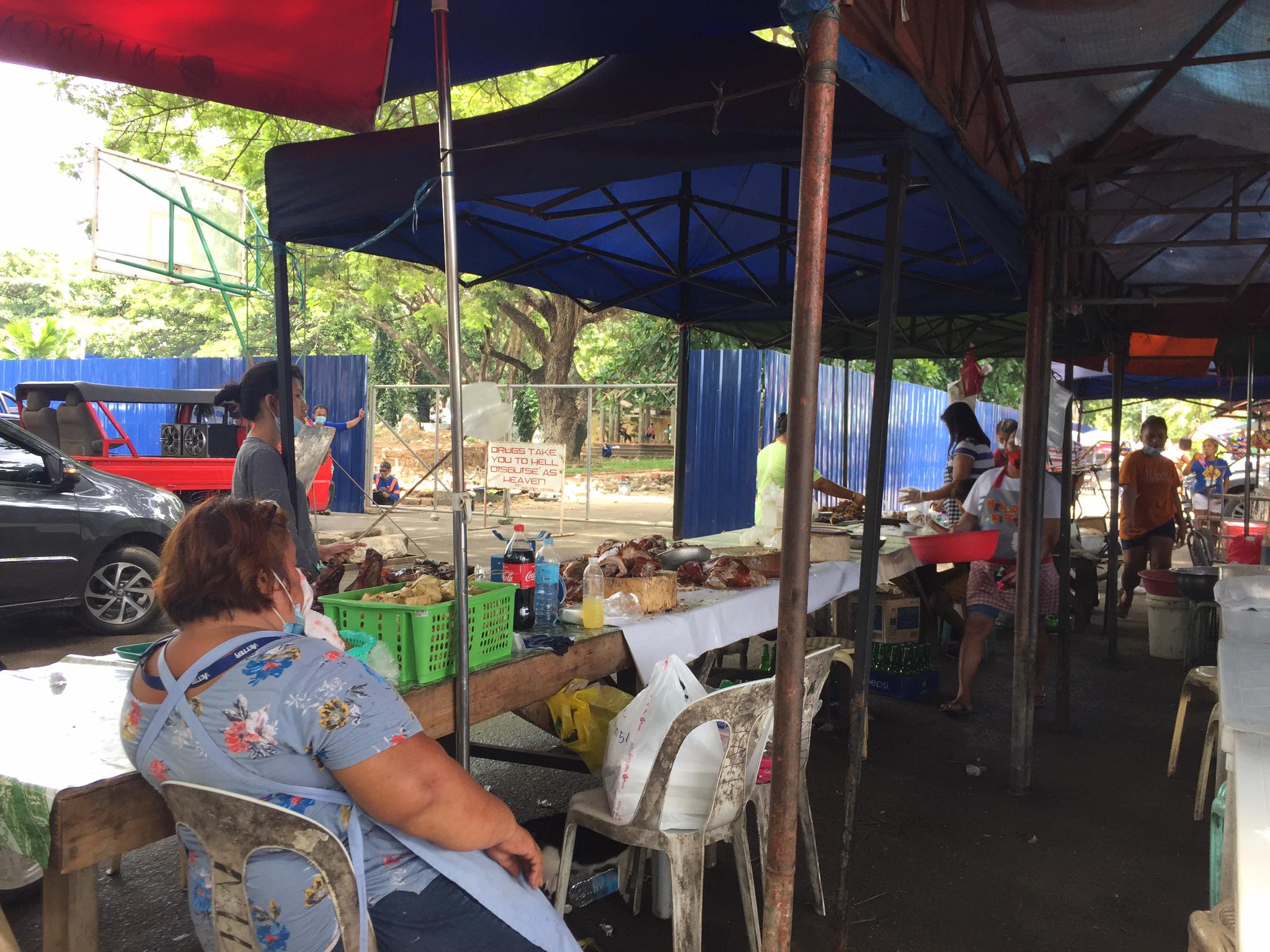 Lechon stall owners in Talisay City notice fewer sales during Halad ...