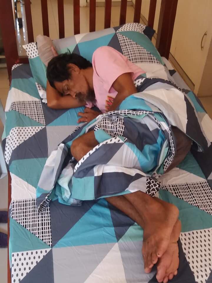 Berta, a homeless man, sleeps comfortably in a bed in Safe Haven rehabilitation center in Barangay Talamban, Cebu City. | Photo courtesy of Channy Catiri