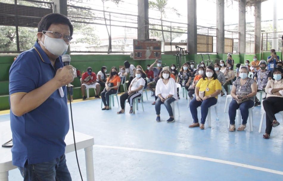 Cebu City Mayor Edgardo Labella leads the distribution of the hazard pay to frontline workers like the barangay workers in Barangay Banilad, Cebu City. | Photo Courtesy of Cebu City PIO