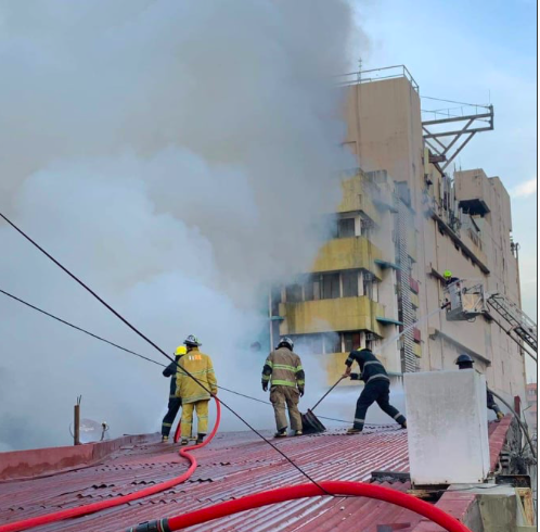 Firefighters battle a late afternoon fire on Friday, October 2, which damaged two commercial buildings in downtown Cebu City. | Photo courtesy of Cebu City Fire Office