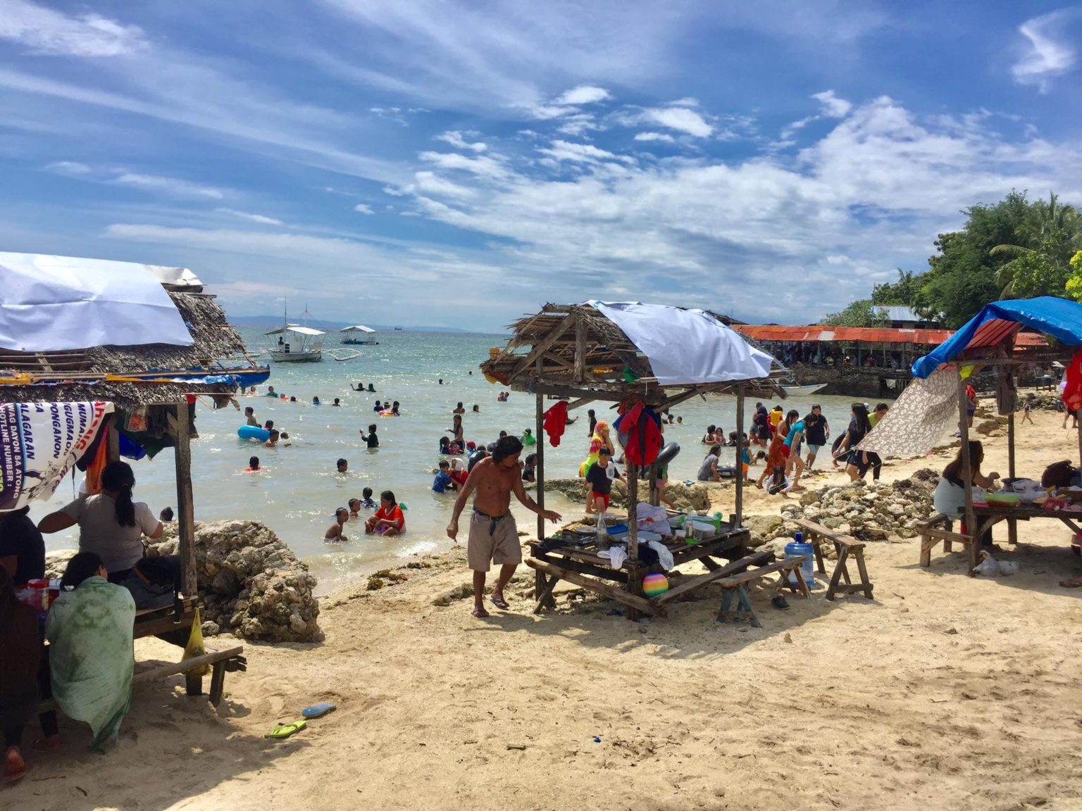 IN PHOTOS: Marigondon Beach reaches full capacity, beachgoers barred ...