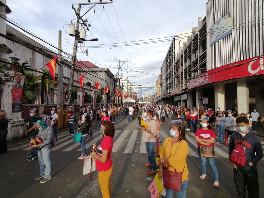 Devotees, who attend the start of the Novena Masses for the Fiesta Señor at the Basilica Minore del Sto. NIño on January 8, observe social distancing and wear face masks and face shields. | CDN Digital file photo (Morexette Marie B. Erram)