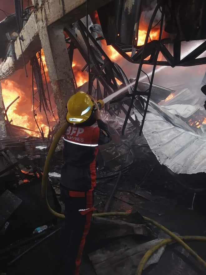 Fire Officer 1 Mark Anthony Yagonia was among the firefighters who responded to the paint warehouse fire in Barangay Cabancalan in Mandaue City on February 15, 2021. | Contributed Photo