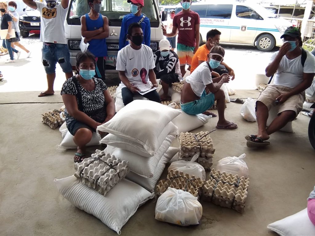 Sacks of rice and eggs worth P2,000 are part of the Department of Agriculture in Central Visayas P5,000 assistance given to 538 fishermen in Lapu-Lapu on Monday, February 15. | Futch Anthony Inso