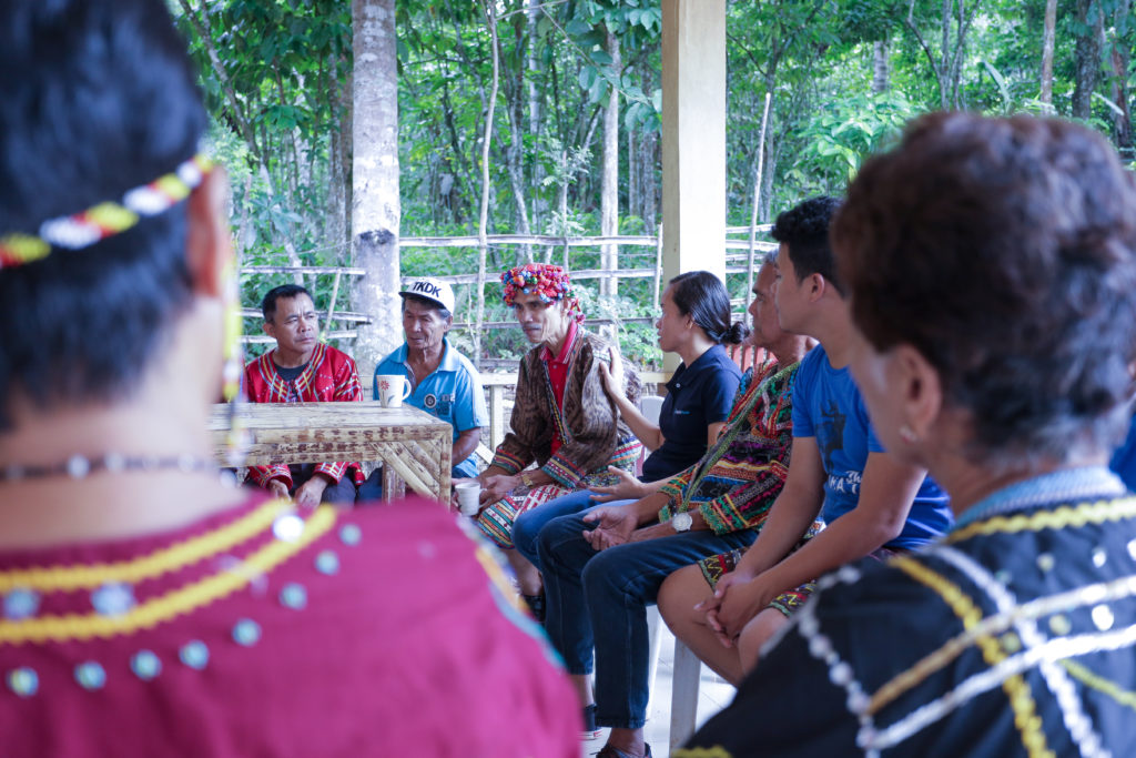 Group of indigenous people in a meeting.
