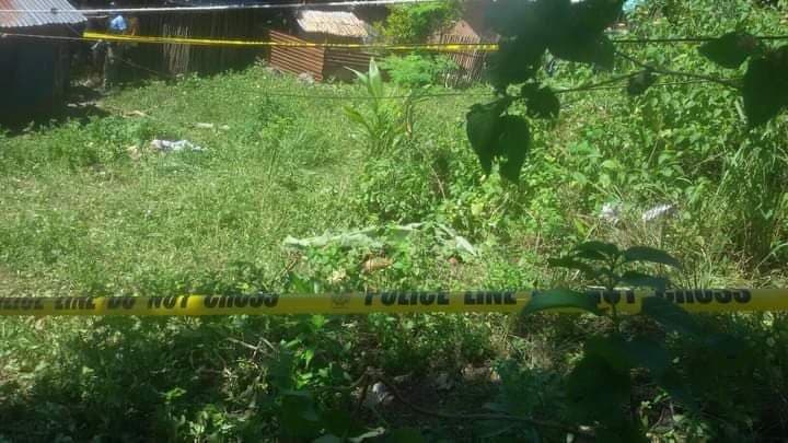 STEPBROTHER IS THE SUSPECT: The police has cordoned off the area where the dead 11-year-old girl was found in a grassy lot in Asturias town in northwestern Cebu on March 1, 2021. The suspect in the crime is the girl's stepbrother. | contributed photo via Paul Lauro