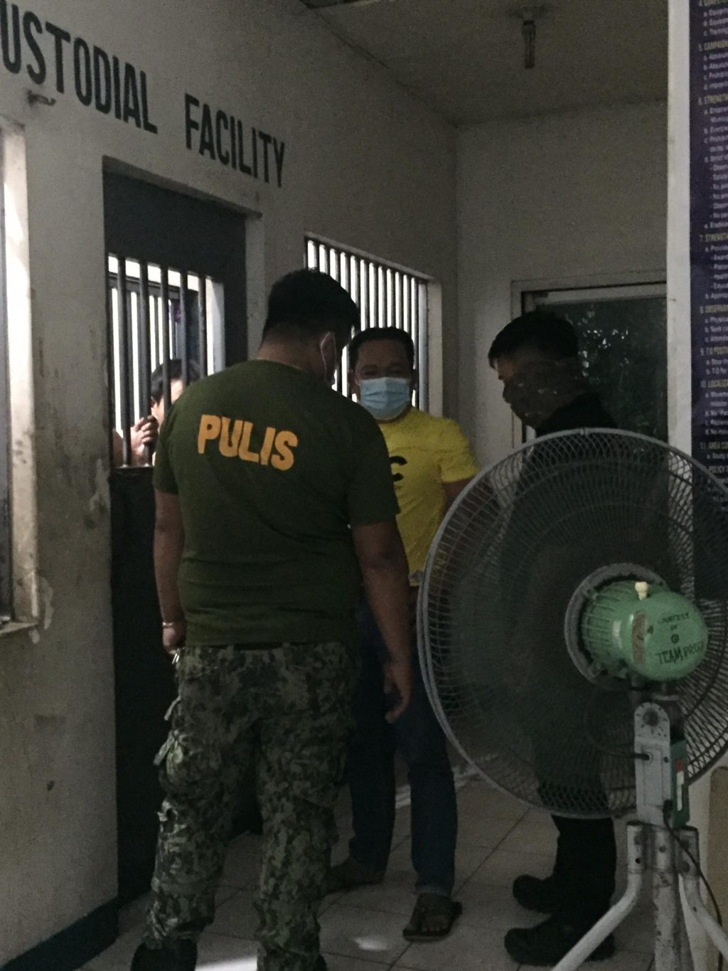 Arrested Police Executive Master Sergeant Julius Obañana, Carmen Police Station's intelligence officer is detained after his arrest in Carmen town, northern Cebu. 