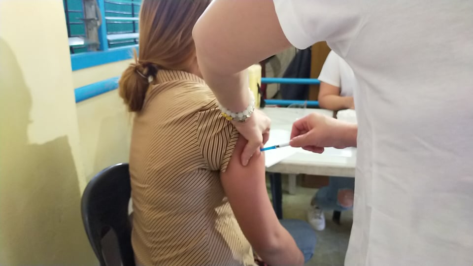A health worker is inoculated during the Cebu City vaccination simulations, which started today, Friday, March 19. | Delta Letigio