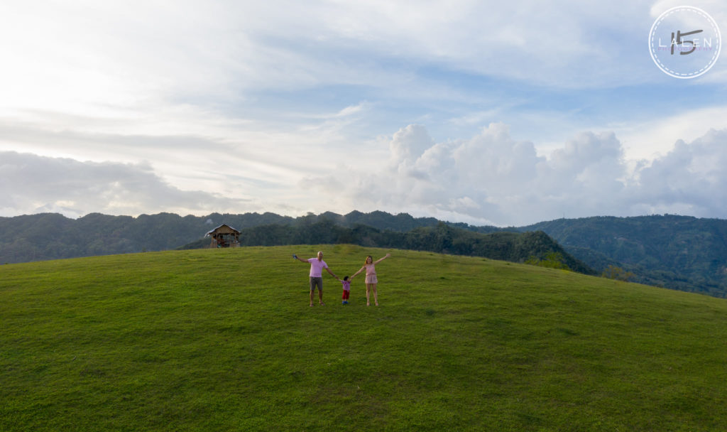 A family enjoys the view from the Switzerland in Cebu, an area in Manipis, Talisay City