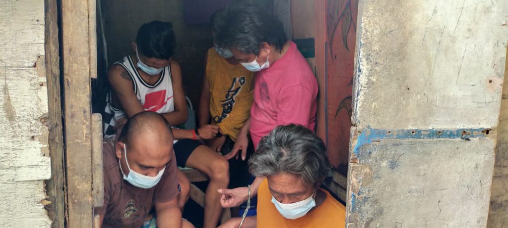 Drug den shut down. These are the persons arrested during the buy-bust operation in a suspected drug den in Sitio Lawis, Barangay Pasil, Cebu City at past noon today, March 13. | Photo courtesy of PDEA-7