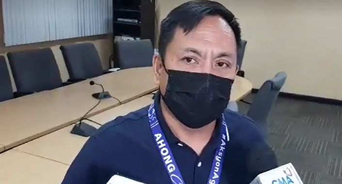 Dr. Ronald Oporto, wearing a blue face mask, medical chief of Lapu-Lapu City Hospital, says the hospital will start their vaccination tomorrow, March 9, and he will be the first to be vaccinated. 