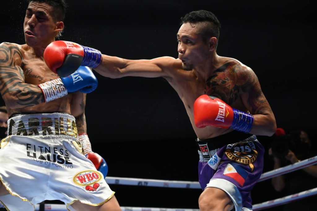 Donnie “Ahas” Nietes connects a right straight to his opponent Pablo Carillo during their WBO International Super Flyweight bout at the Caesar's Palace Rotunda in Dubai UAE. | Photo courtesy of D4G Promotions