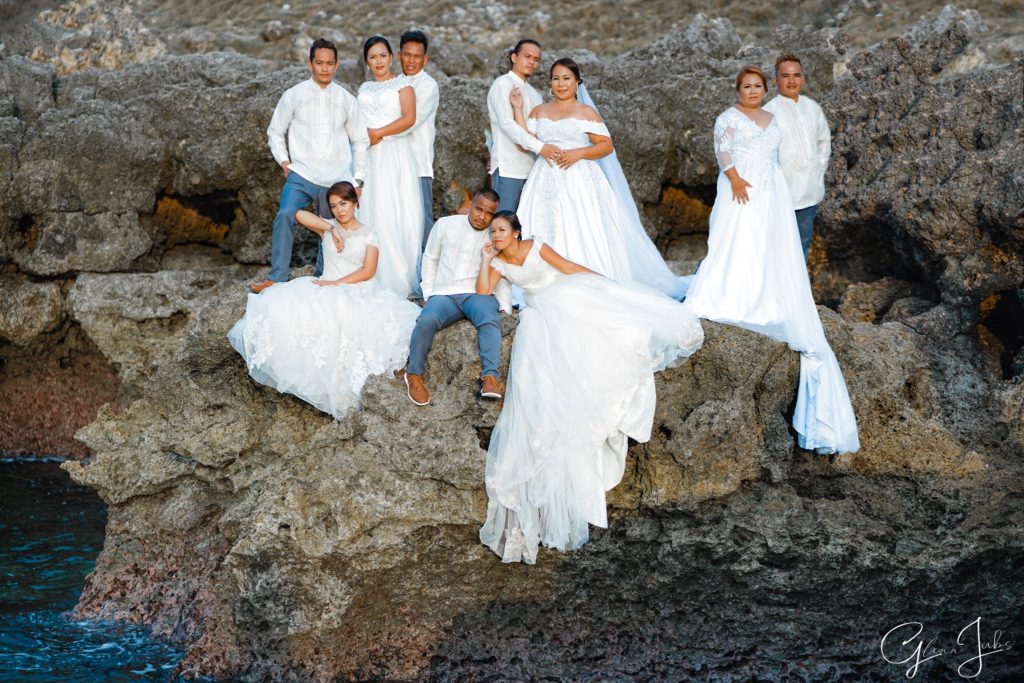Wedding planners gift to 5 couples: Free wedding. In this photo a prenup shot of the couple posing on a rocky ledge.