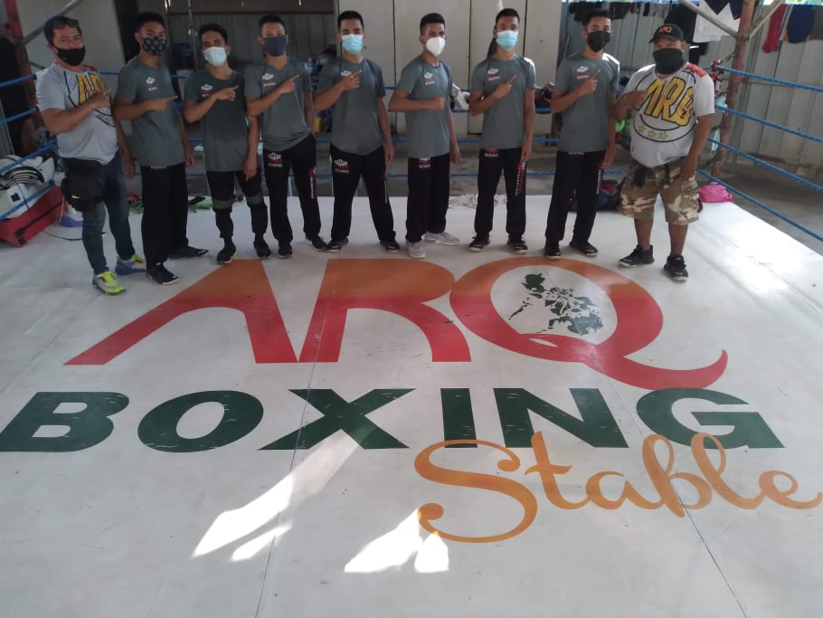 ALWAYS Ready. Despite the rescheduling of their upcoming bouts, ARQ Boxing Stable boxers continue to train at their gym in Kinasang-an, Barangay Pardo, Cebu City with their trainer Eldo Apawan Cortes (extreme left).
