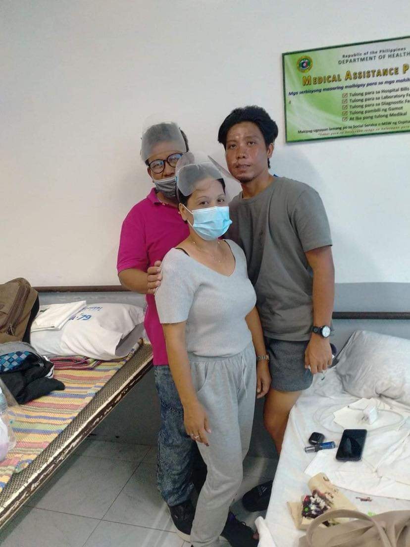 The Talisaynon crewman of the ill-fated vessel Jojie Villanueva is reunited with his family in a Caraga Region hospital. 