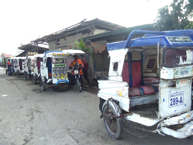 Legitimate tricycle drivers in Mandaue City will receive their P5,000 fuel subsidy from the city government on June 30 and July 1. In photo are tricycles at their parking area waiting for their turn to ferry passengers in Mandaue City. | Mary Rose Sagarino