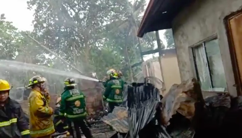 Firefighters are overhauling the fire scene or making sure that the fire is really out in Sitio Pilit, Barangay Cabancalan, Mandaue City at past 6 a.m. today, May 15. | screengrab from Paul Lauro's video