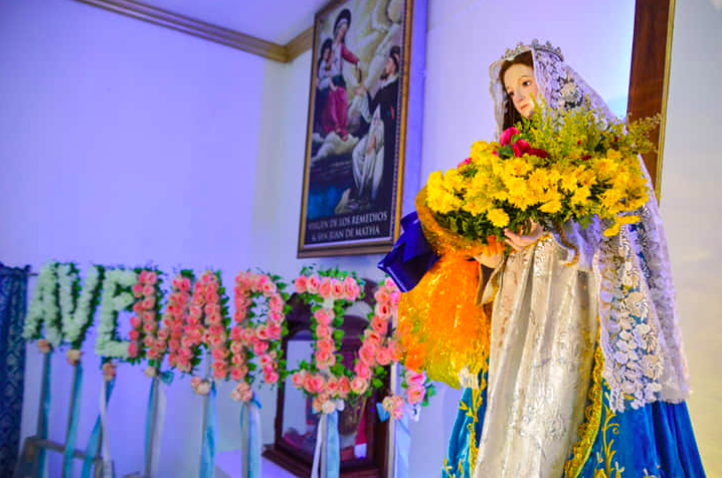 Letters that spell 'Ave Maria' stand beside the image of the Blessed Virgin Mary inside the Parroquia de Virgen Remedios in Minglanilla, Cebu as the parish virtually continues their celebration of Flores de Mayo. | Contributed photo