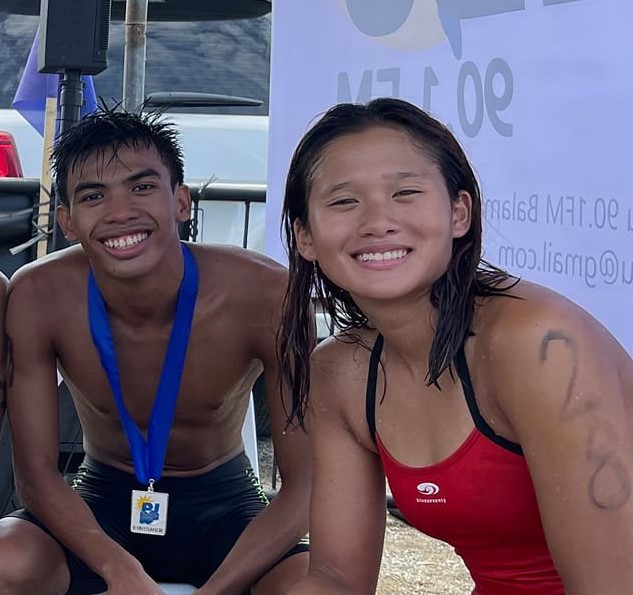 Talisay Luigi Triathlon Group Go For Gold swimmers such as Andrew Kim Remolino (left) and Raven Faith Alcoseba win in the open swimming challenge in Pinamungajan town.| Photo from Fritz Tan Alcoseba
