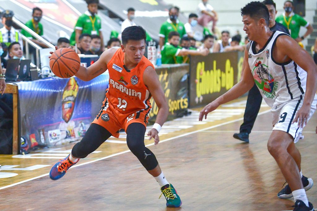 PAGADIAN EXPLORERS VS. JPS ZAMBOANGA. In photo is Von Lloyd Dechos of the Pagadian Explorers (wearing orange jersey), who will try to help the Explorers win in their upcoming game on Tuesday against the powerhouse JPS Zamboanga in the VisMin Super Cup Mindanao leg. | Photo from VisMin Cup media bureau
