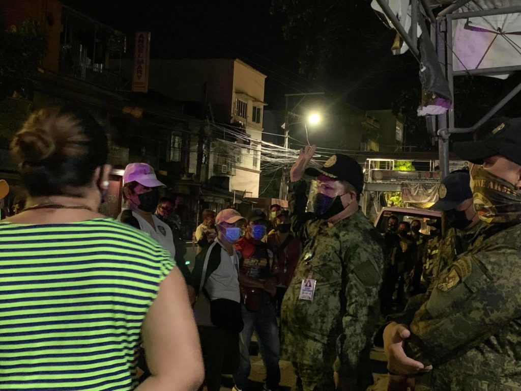 Police probe alleged firing of guns in Buhisan, Cebu City. In photo is Police Major Janelito Marquez, Labangon Police Station chief, and his men, who were investigating the alleged firing of guns incident in Barangay Busay, Cebu City on Saturday, April 30. | Contributed photo