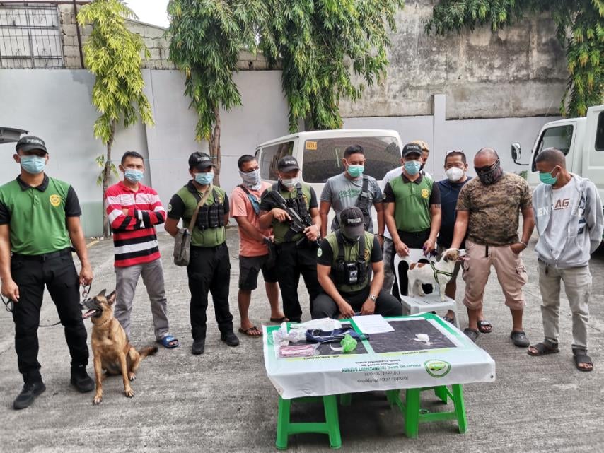 PDEA-7 personnel, particularly from the Philippine Drug Enforcement Agency Bohol Field Unit pose with the K9 units with their newly acquired narcotic detection dogs.