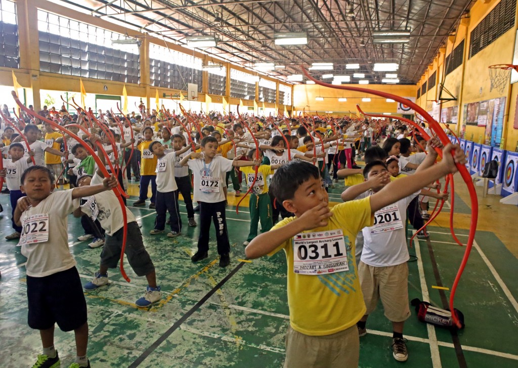 PVC archery program. :Participants of the "World's Largest Archery Competition" in 2014 at the Cebu City Sports Center. | CDN File Photo