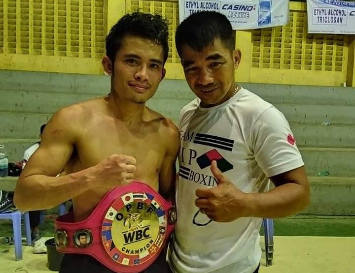 Melvin Jerusalem (left) is with his trainer Michael Domingo. | Photo from Jerusalem's Facebook account.
