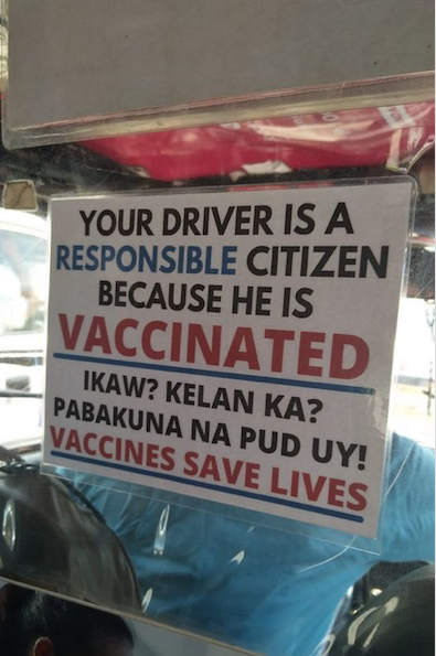 Netizens praise jeepney driver for placing a sign in his jeepney encouraging passengers to get vaccinated.
