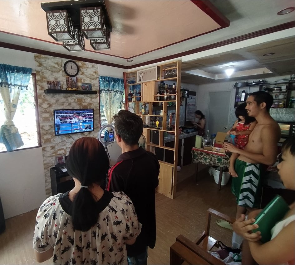 Pacquiao-Ugas fight. A family from Carcar City made their Sunday bonding more intense as they watch the Pacquiao-Ugas fight today, August 22. | contributed photo