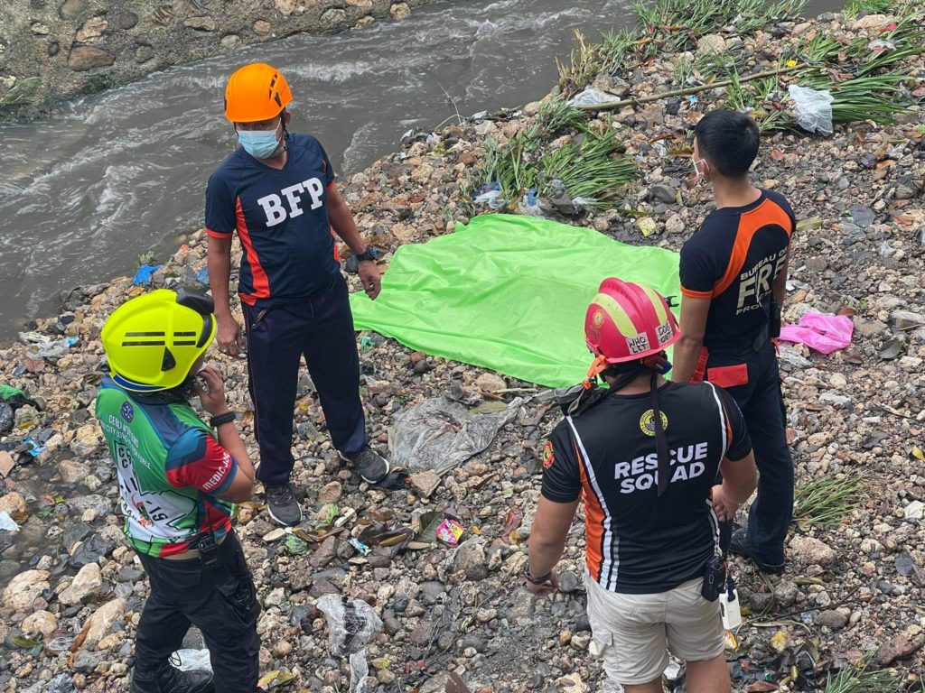 GIRL DEAD. The body of the dead 3-year-old girl was found a few kilometers away from her home after she fell on the Mahiga Creek in Barangay Kasambagan, Cebu City and got carried away by the onrushing  water of the creek at past 4 p.m. today, August 9.  | Photo of BFP-7