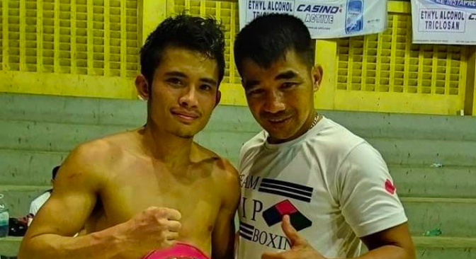 Melvin Jerusalem (left) is with his trainer Michael Domingo. | Photo from Jerusalem's Facebook account.