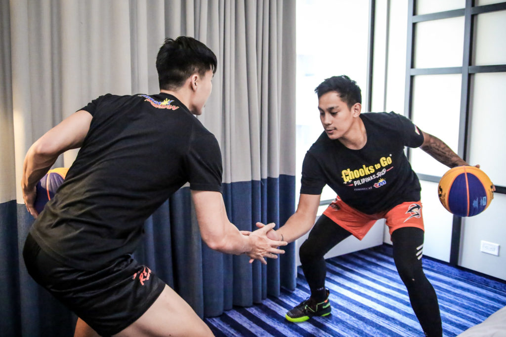 Cebuano cagers Zach Huang (left) and Mac Tallo (right) doing some last minute training routine in their hotel to prepare for tomorrow's game in the FIBA 3x3 Montreal World Tour in Canada. | Photo from Chooks-To-Go Pilipinas
