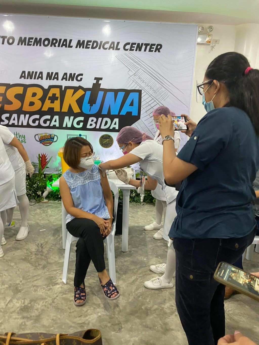 Cebu Island has reached 1 million individuals inoculate d of their first dose of COVID-19 vaccine. In photo is Dr. Mary Jean Loreche having her first jab during the ceremonial Covid-19 vaccination in Cebu City at Vicente Sotto Memorial Medical Center last March 4. | Photo Courtesy of OPAV