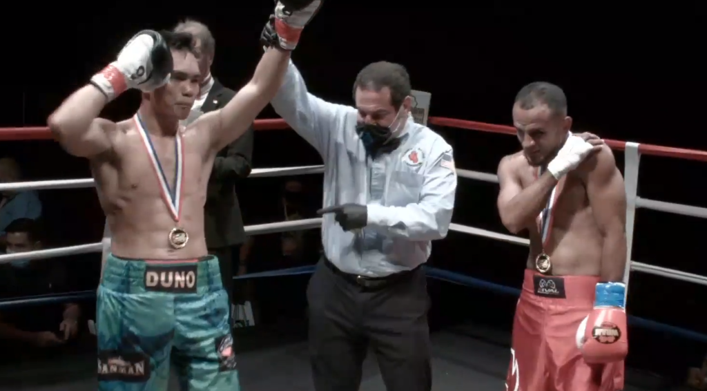 "RUTHLESS" DUNO WINS. Romero "Ruthless" Duno raises his hands after winning in his bout versus Jonathan Perez of Colombia in Miami, Florida on Saturday. | Screengrab from the live stream video.