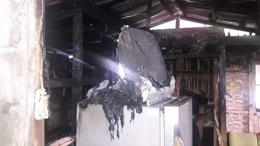 PUBLIC URGED AGAIN TO BE FIRE SAFETY CONSCIOUS. In photo is a burnt appliance is seen inside a house in Barangay Tisa, Cebu City, which was destroyed by a fire on Wednesday, Sept. 29. | Paul Lauro