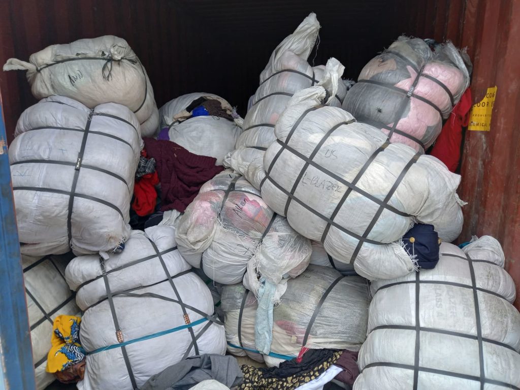 Bales of used clothing or ukay-ukay are confiscated by the Philippine Coast Guard inside one of the warehouses in Mandaue City. | Mary Rose Sagarino