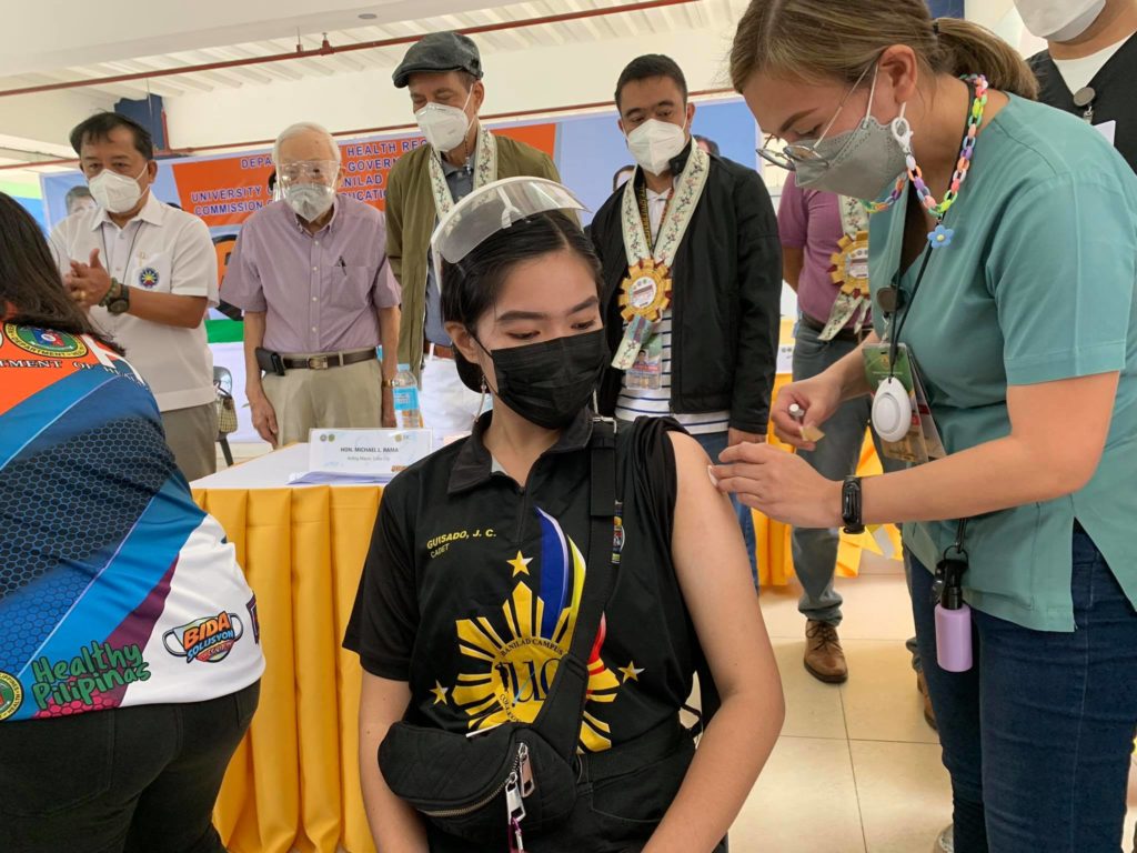 One of the college students of higher education instiutions in Cebu City gets vaccinated in one of the city's vaccination site. | Dyrecka Letigio