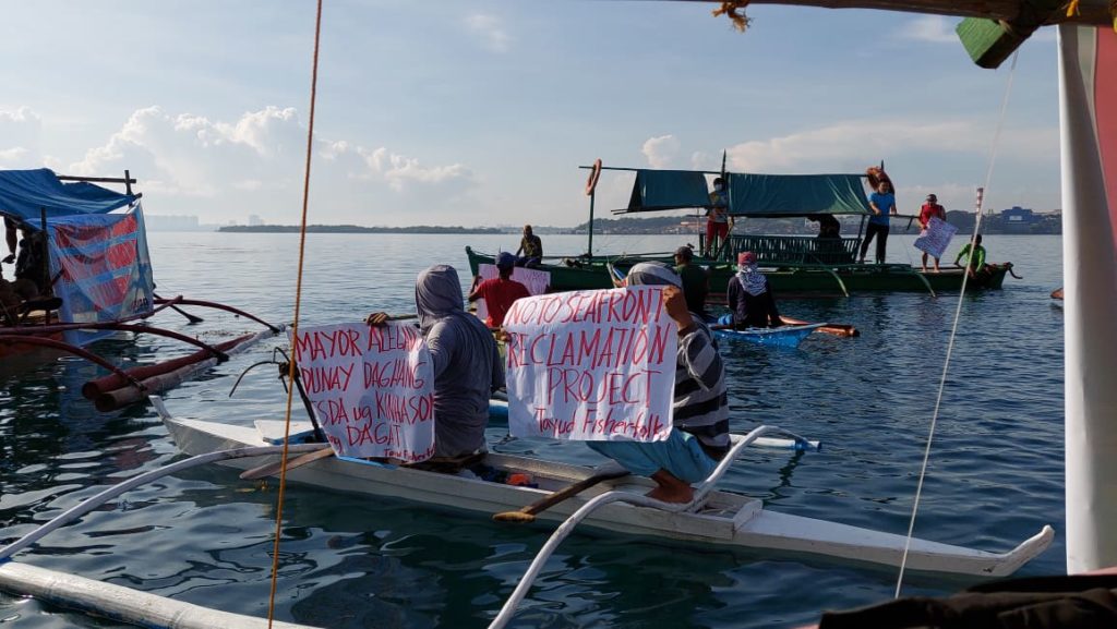 The battle is still on - Consolacion shipyard firms over reclamation project: Fishermen hold a protest at sea on their wooden outriggers off the coast of Barangay Tayud, Consolacion town in northern Cebu to oppose the planned reclamation project in the area.