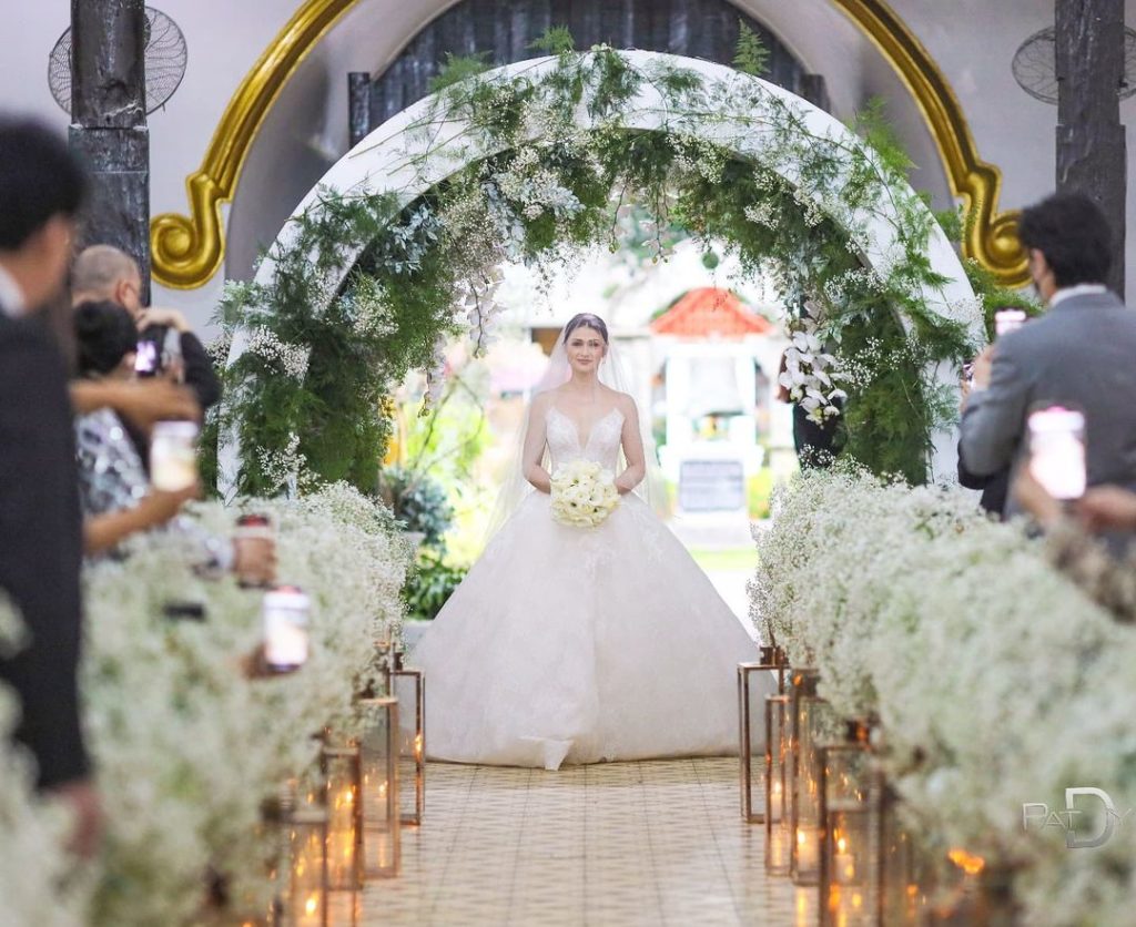Carla Abellana walks the aisle during her wedding with Tom Rodriguez.