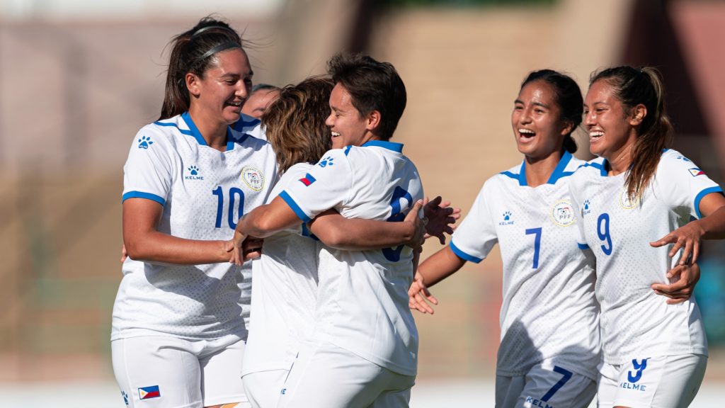 PHILIPPINE MALDITAS TO FACE FORMIDABLE FOES IN INDIA. Players of the Philippine Women's National Football Team celebrate after scoring a goal against Hong Kong during their match on Sept. 25 in the AFC Women's Asian Cup qualifiers in Tashkent, Uzbekistan. | Photo from the AFC Asian Cup Facebook Page.