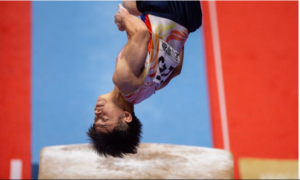 The Philippines’ Carlos Edriel Yulo competes in the vault event at the men’s apparatus finals during the Artistic Gymnastics World Championships at the Kitakyushu City Gymnasium in Kitakyushu, Fukuoka prefecture on October 24, 2021. (Photo by Philip FONG / AFP)